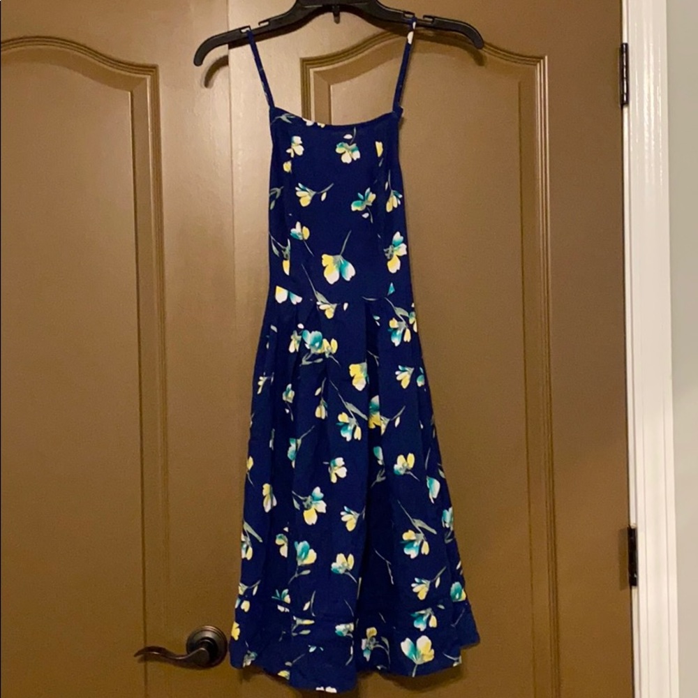 Blue dress w/ flowers,straps that cross in back